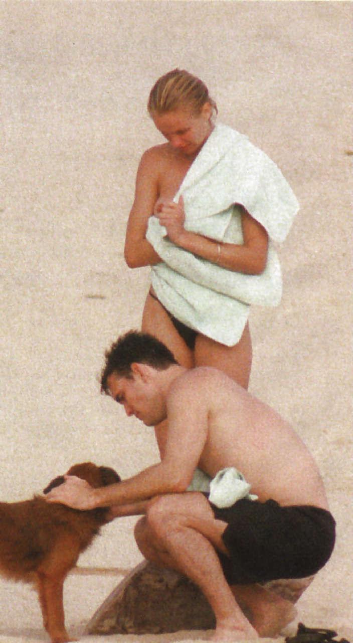 10P Cameron Diaz exposing her nice small boobs while enjoy with boyfriend on beach