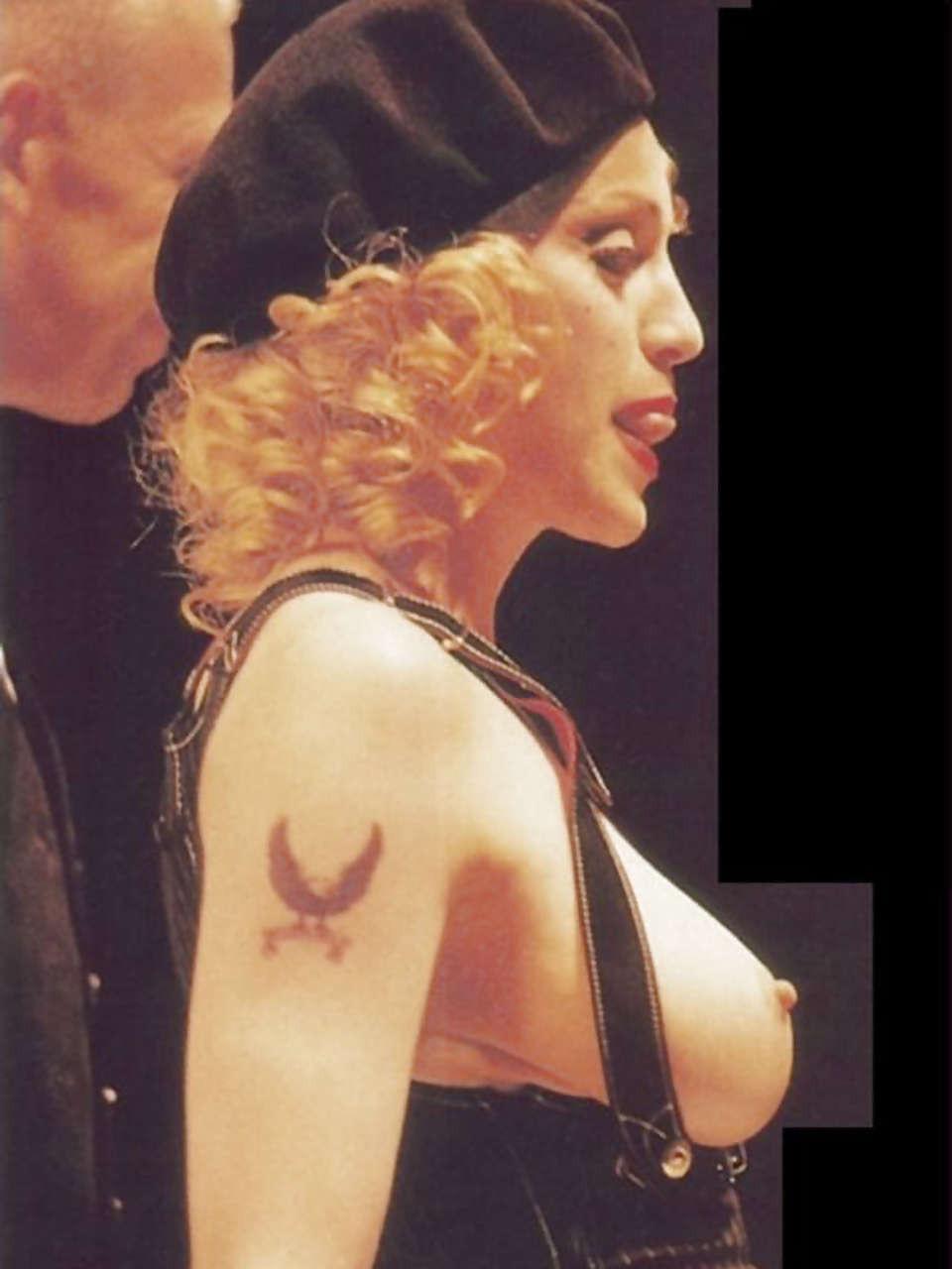 10P Madonna exposing her nice boobs in public and posing in panties