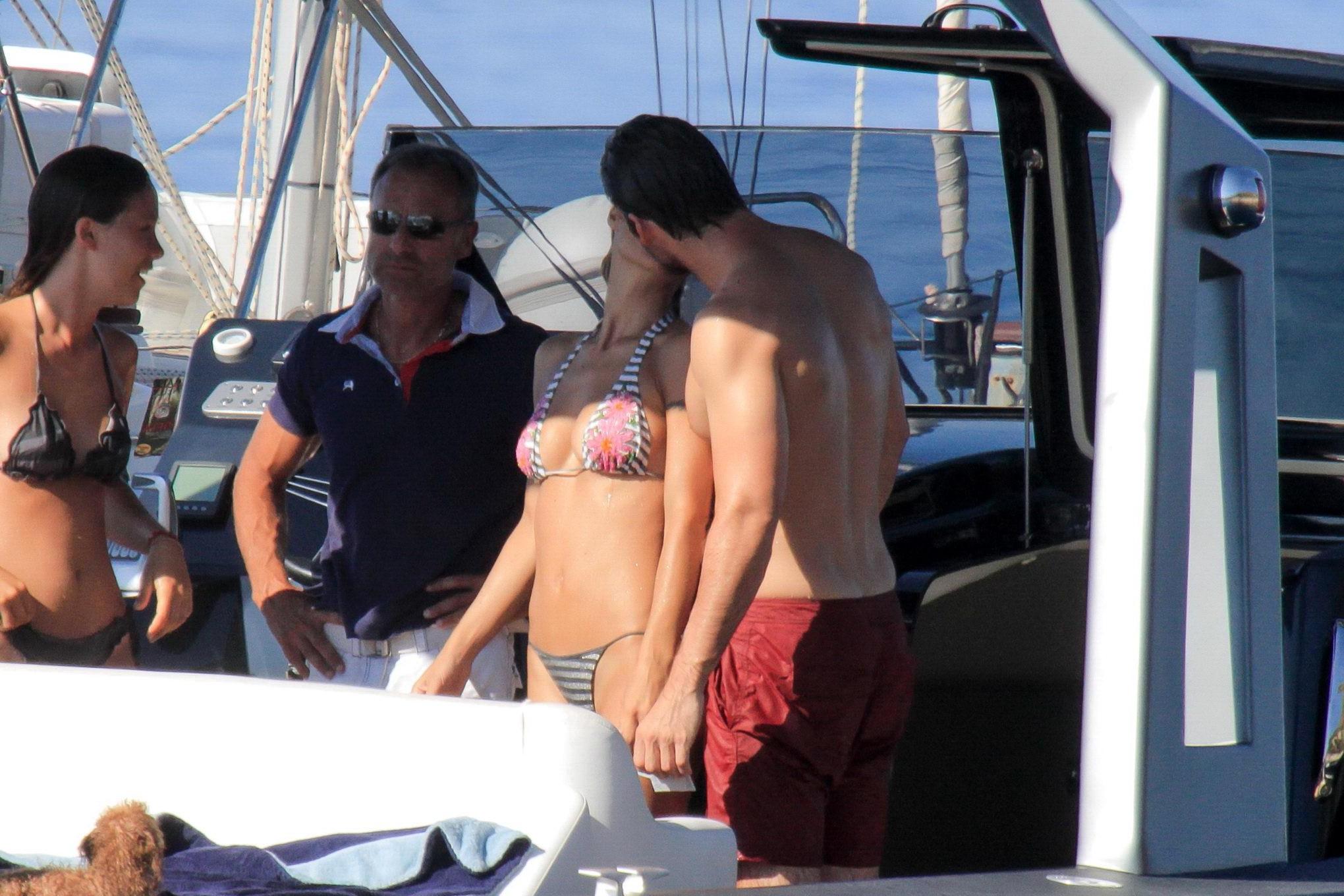 10P Michelle Hunziker wearing a thong bikini on a yacht in Elba