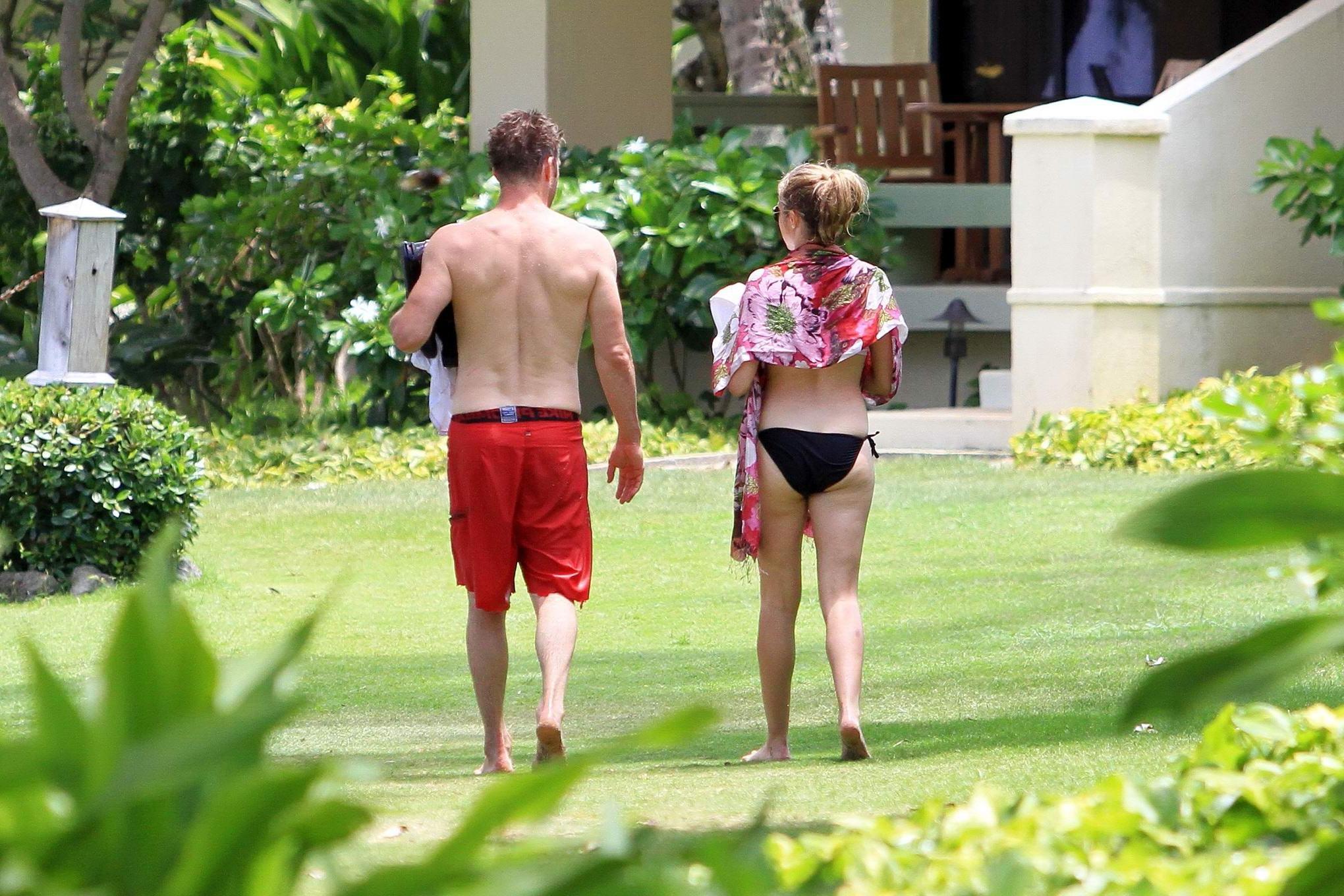 10P Teresa Palmer shows boobs wearing a wet see through bikini in Hawaii