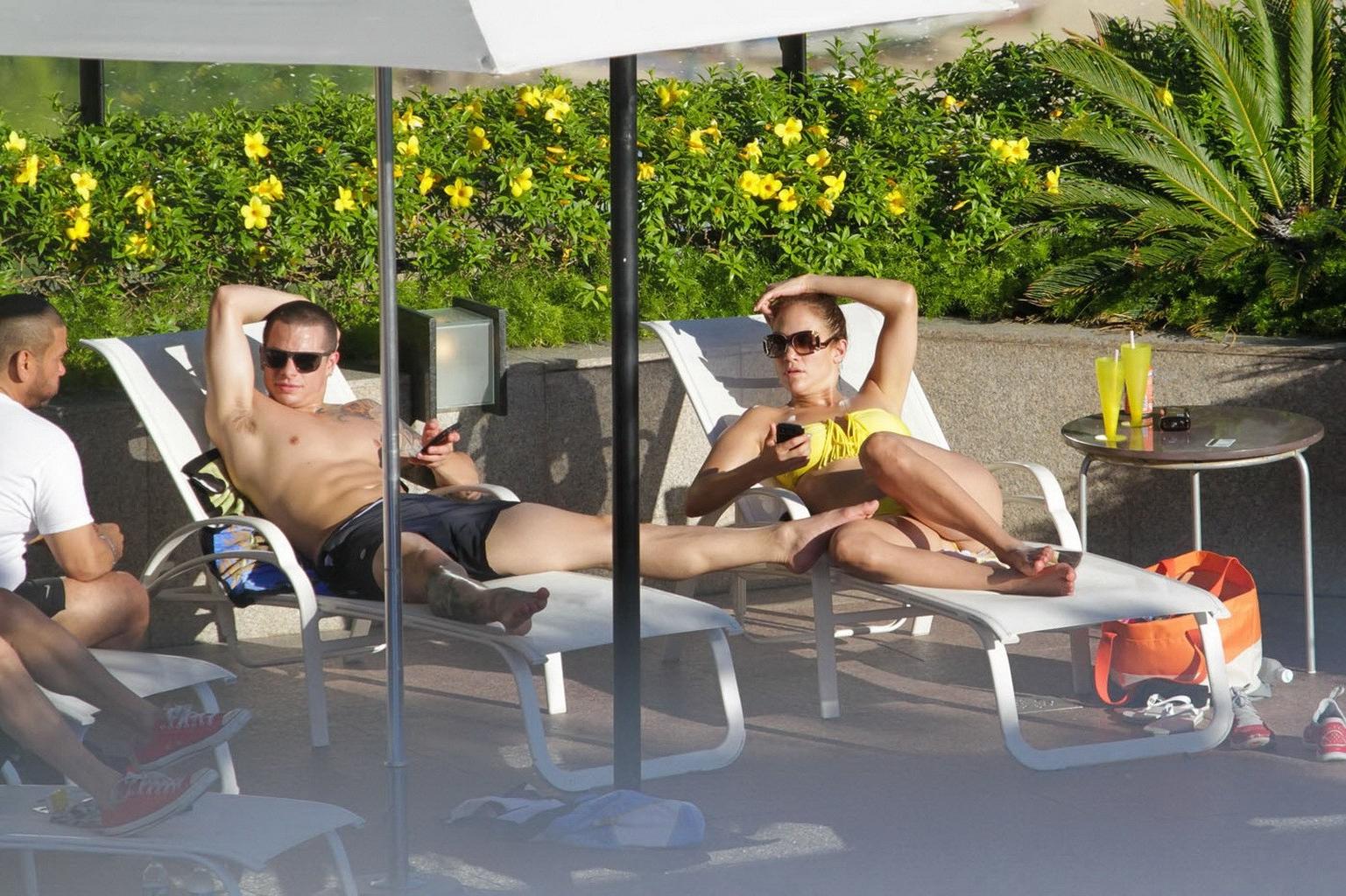 10P Jennifer Lopez showing off her  toned body wearing strapless canary bikini pools