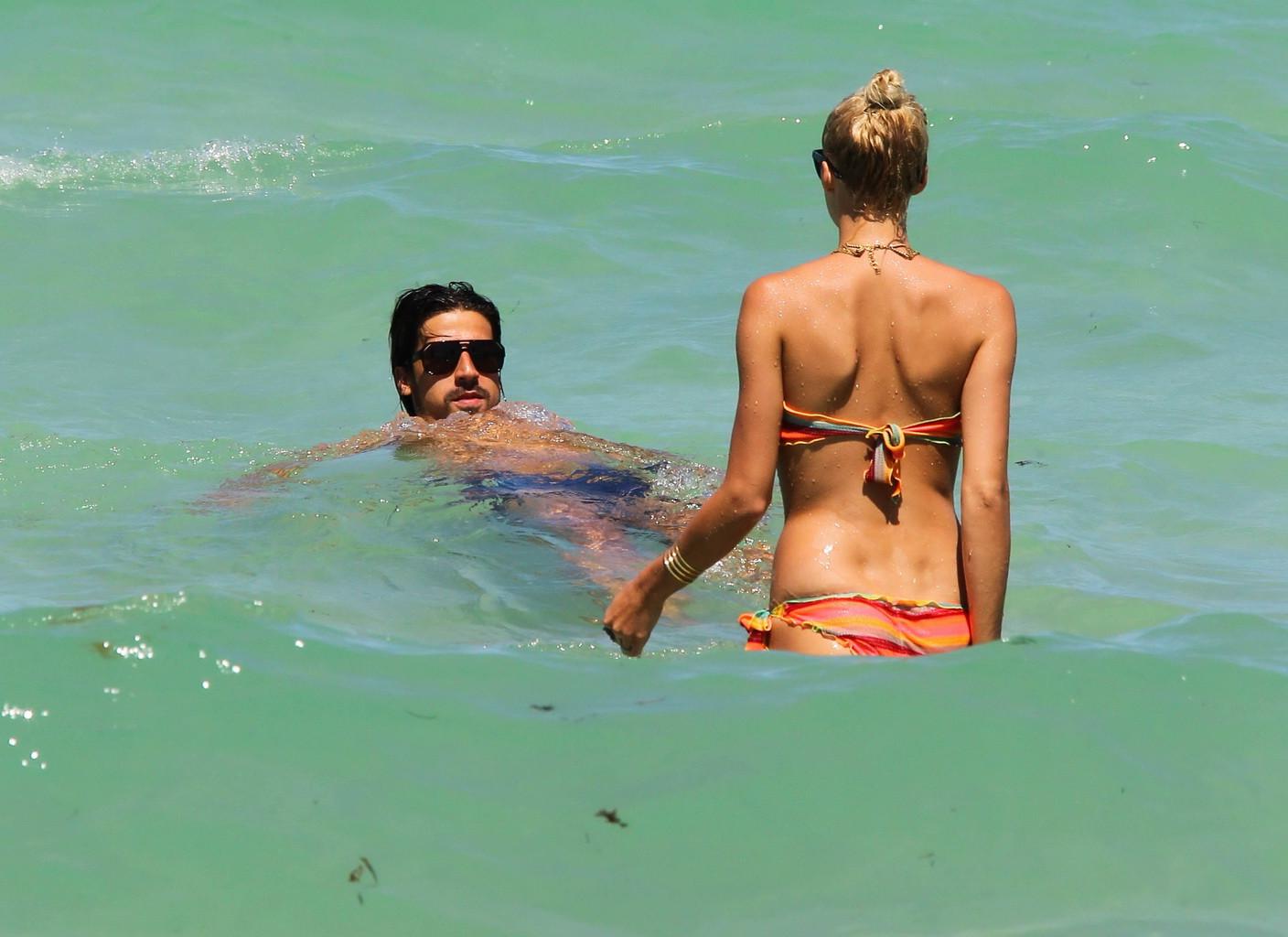 10P Lena Gercke showing off her hot body in skimpy multicolored bikini at the beach 