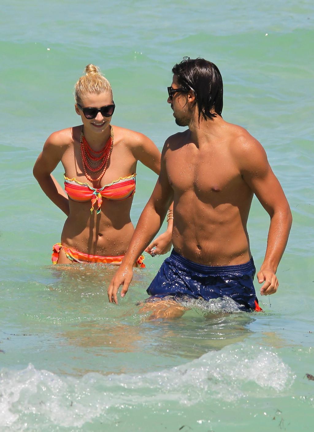10P Lena Gercke showing off her hot body in skimpy multicolored bikini at the beach 