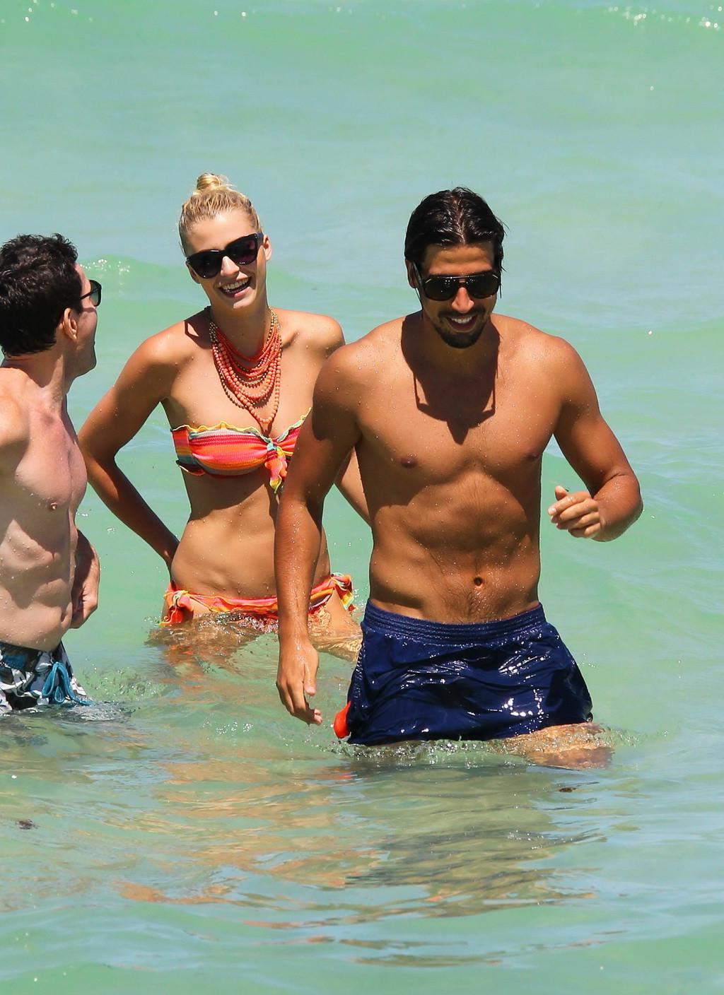 10P Lena Gercke showing off her hot body in skimpy multicolored bikini at the beach 
