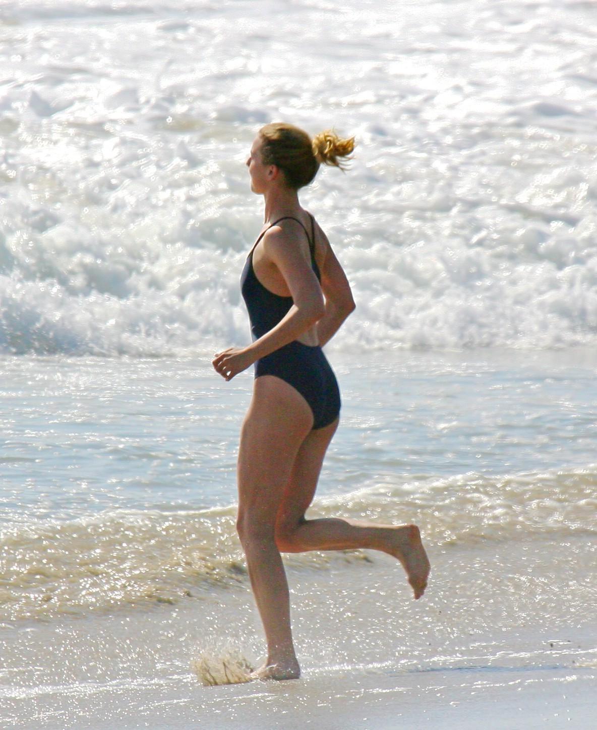 10P Emily VanCamp in snake print bikini petting with her boyfriend poolside in Monac