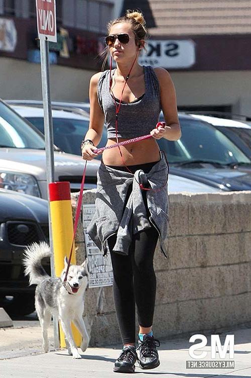 10P Miley Cyrus exposing sexy ass and nice tits on street