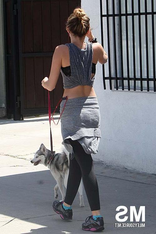 10P Miley Cyrus exposing sexy ass and nice tits on street