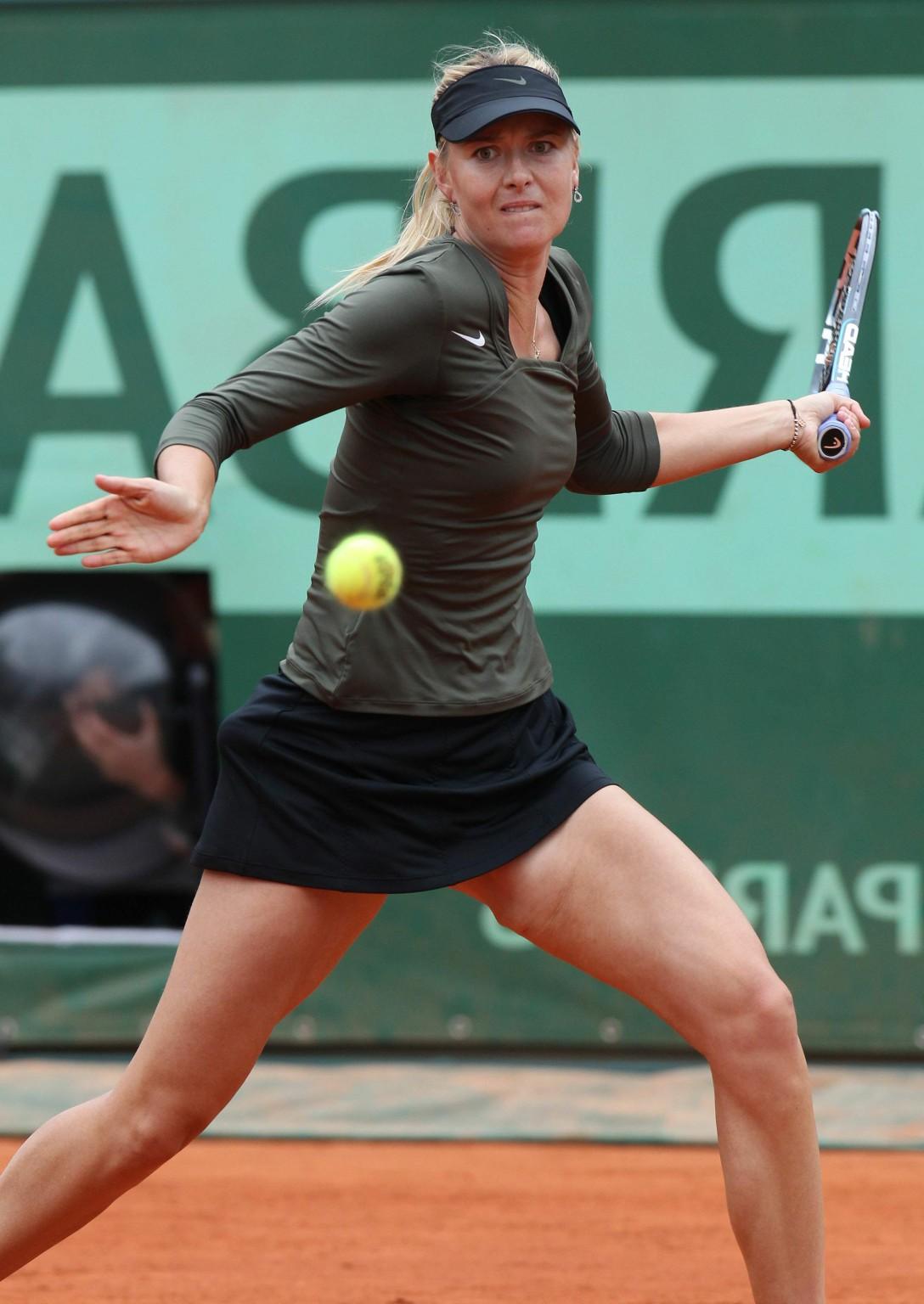 10P Maria Sharapova flashes her pink panties while playing at Roland Garros