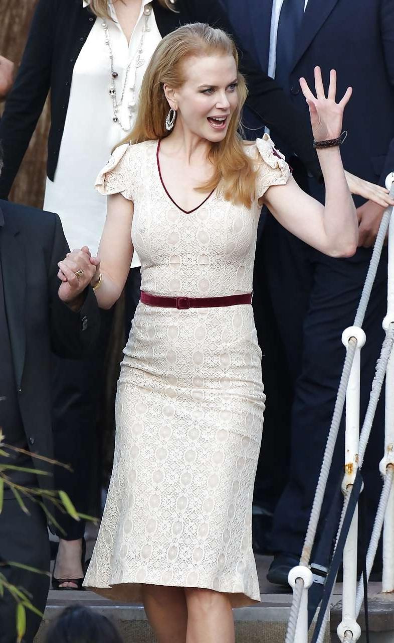 10P Nicole showing her nice boobs in see thru dress