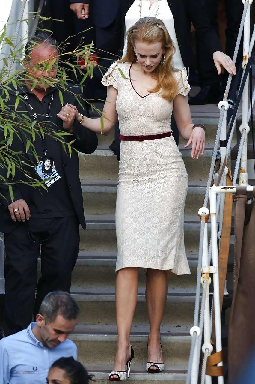10P Nicole showing her nice boobs in see thru dress