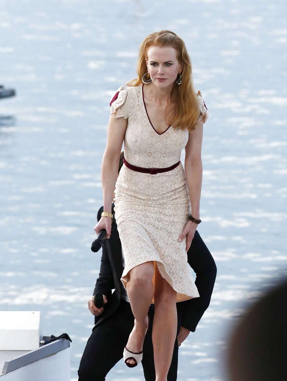 10P Nicole showing her nice boobs in see thru dress