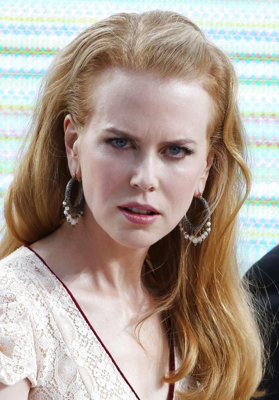 10P Nicole showing her nice boobs in see thru dress