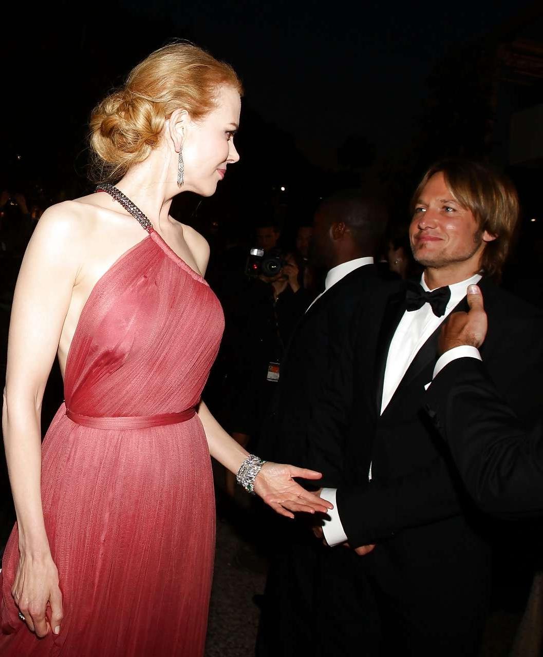 10P Nicole showing her nice boobs in see thru dress