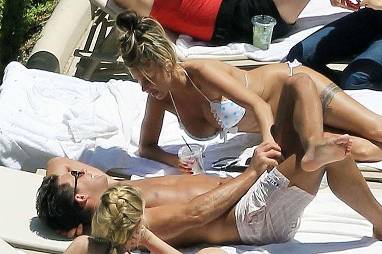 10P Katie Price giving hand job to her boyfriend on beach