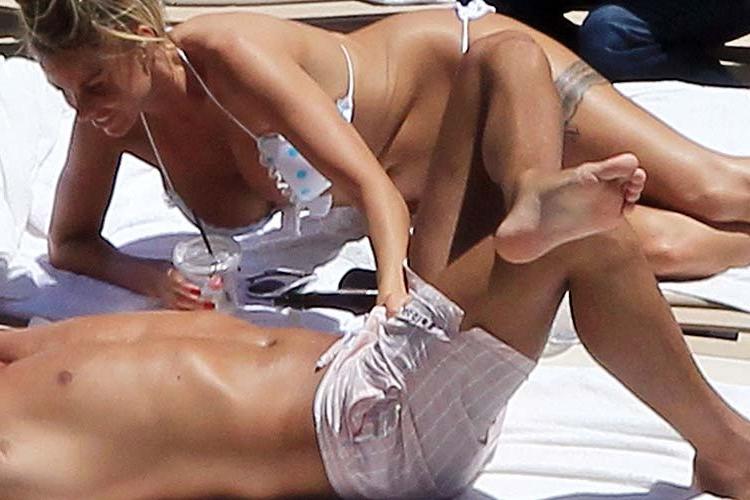 10P Katie Price giving hand job to her boyfriend on beach