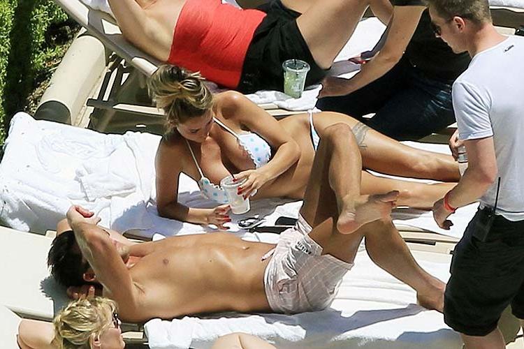10P Katie Price giving hand job to her boyfriend on beach