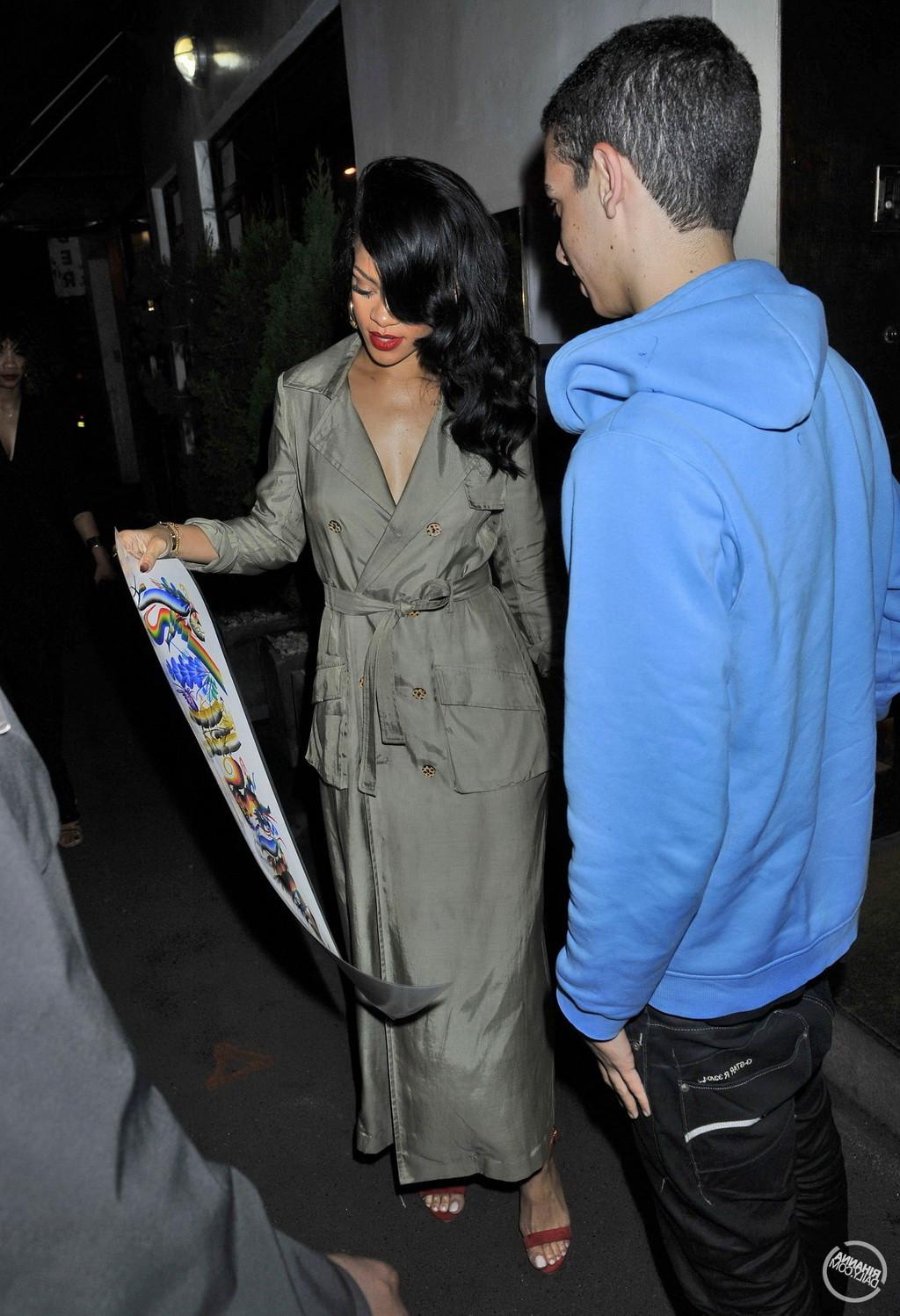 16P Rihanna showing big cleavage  long legs in wide open topcoat out in Sydney and a