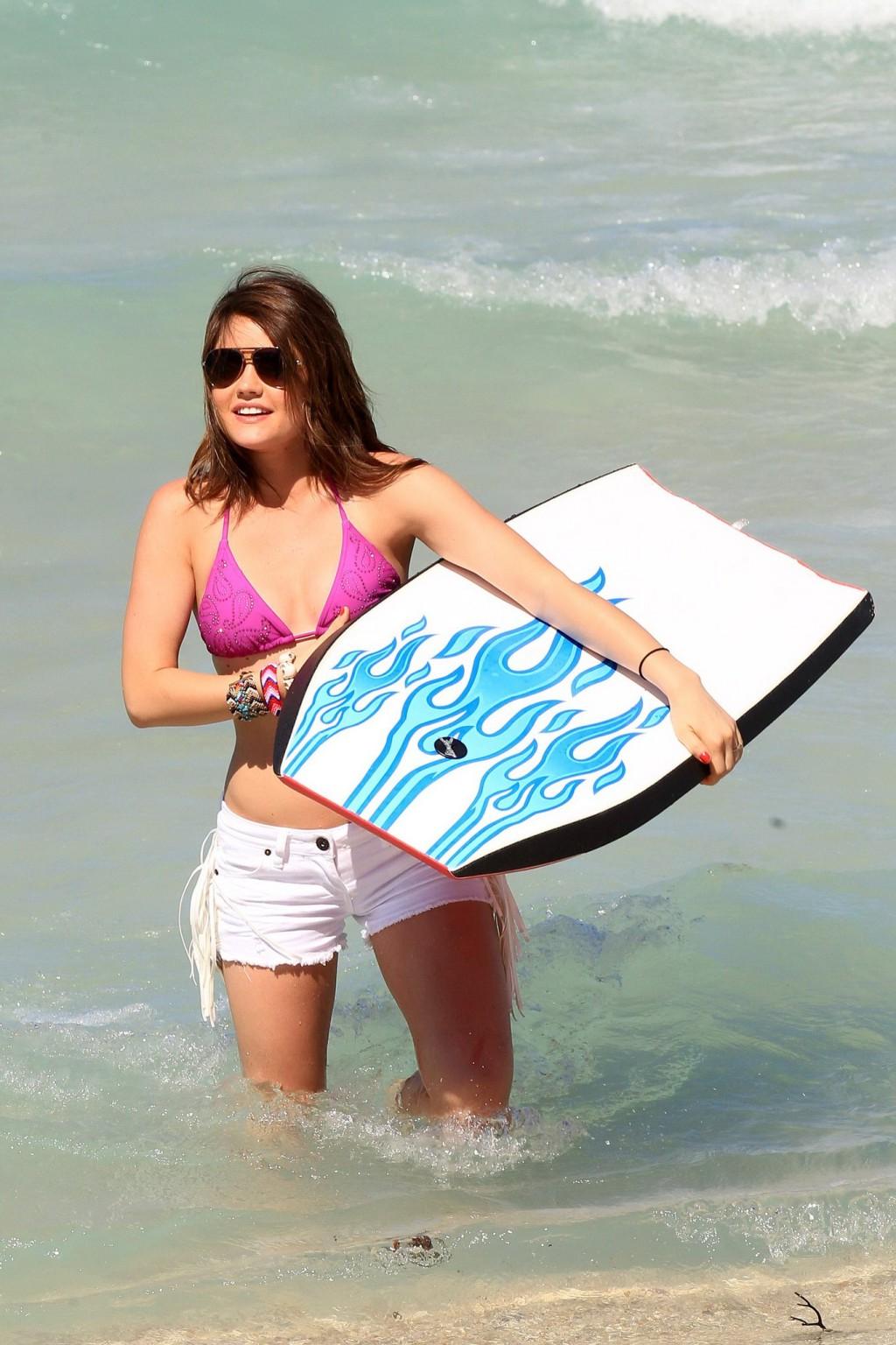 16P Lucy Hale in bikini top  shorts humping her boyfriend at the 'Bongo Meet 'n' Gre