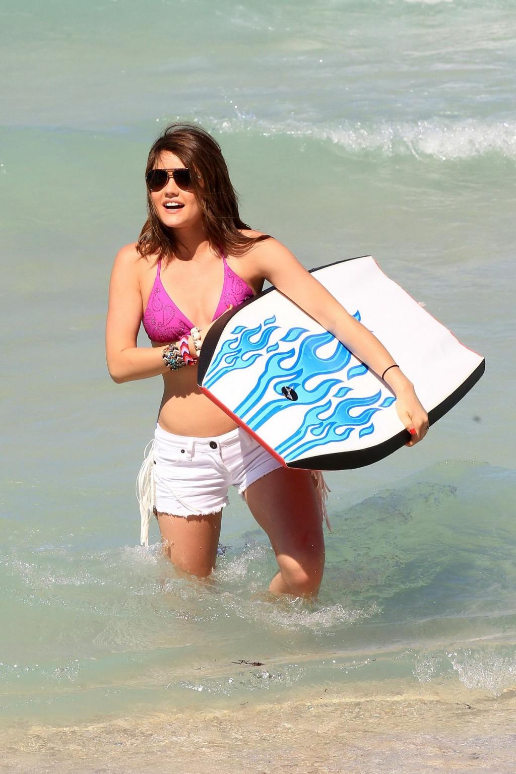 16P Lucy Hale in bikini top  shorts humping her boyfriend at the 'Bongo Meet 'n' Gre