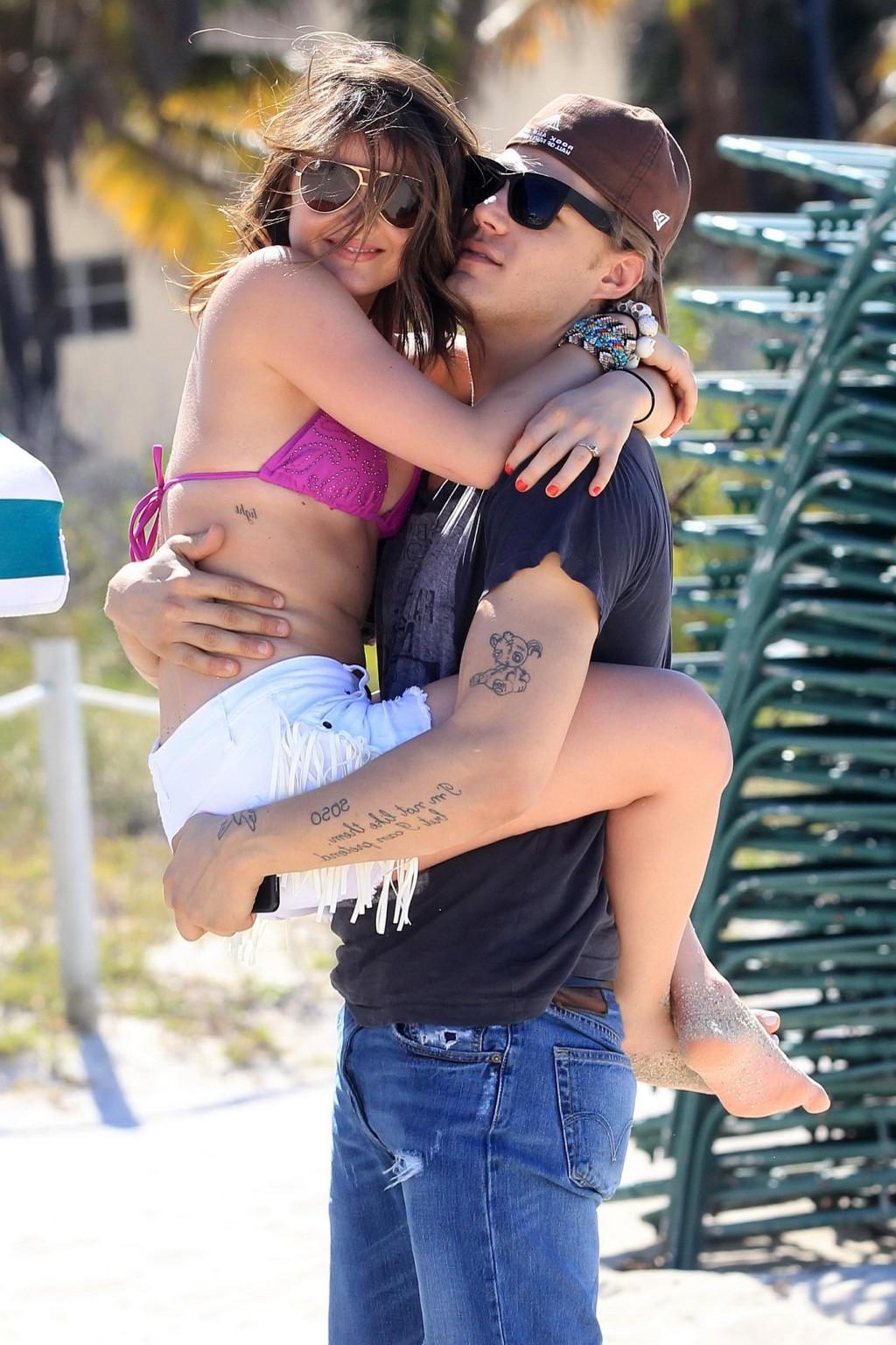 16P Lucy Hale in bikini top  shorts humping her boyfriend at the 'Bongo Meet 'n' Gre