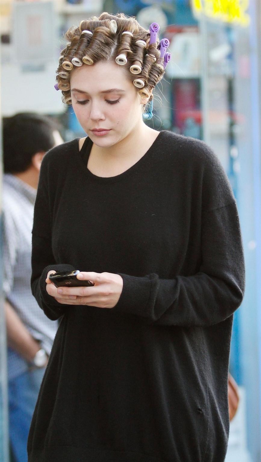 16P Elizabeth Olsen braless wearing a slightly see through top on 'Kill Your Darling
