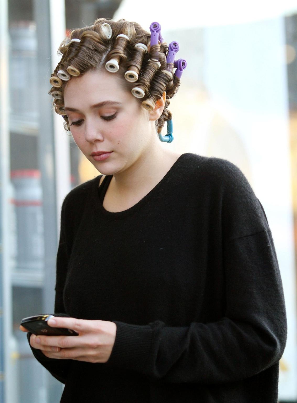16P Elizabeth Olsen braless wearing a slightly see through top on 'Kill Your Darling