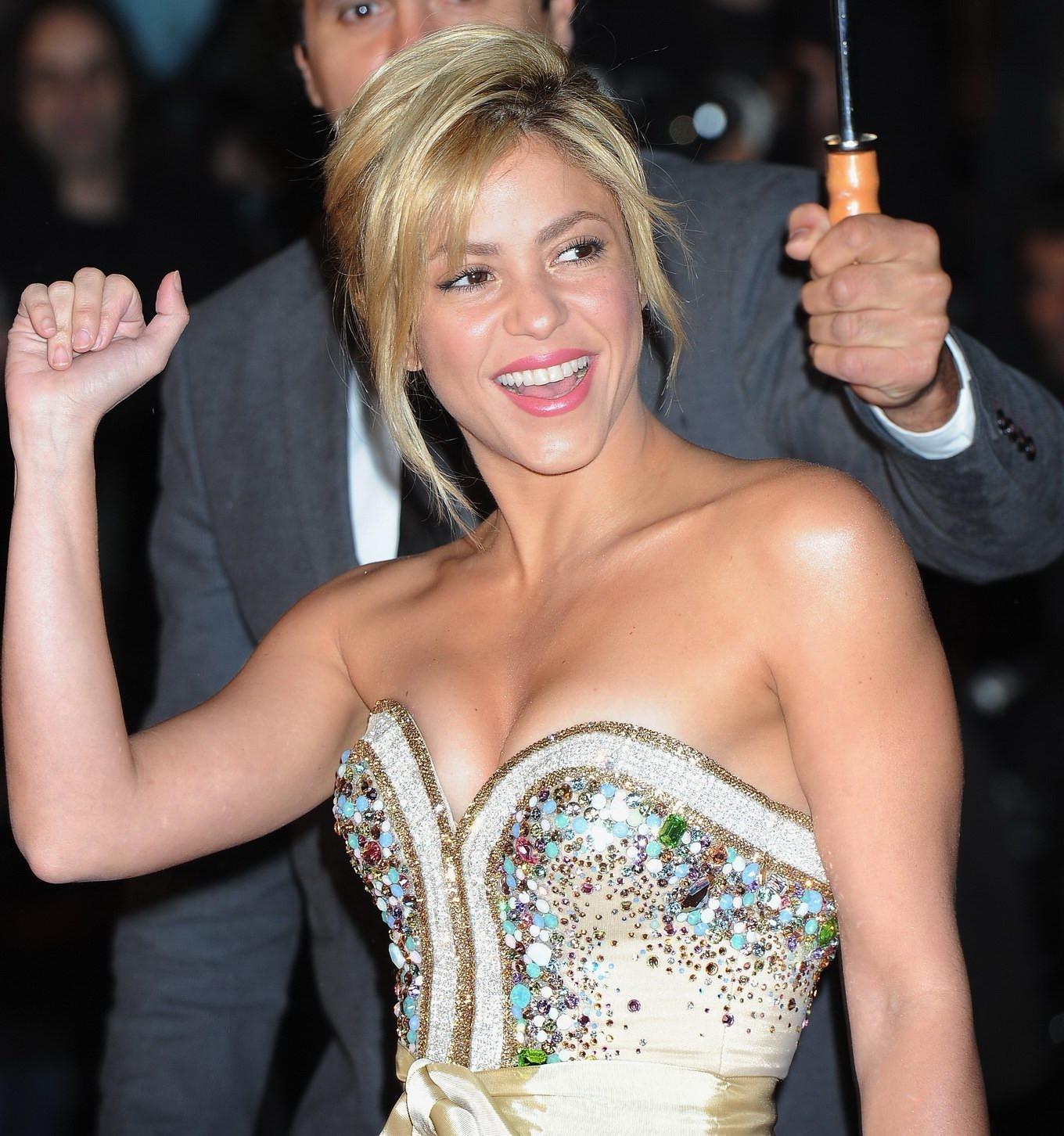 16P Shakira busty wearing a strapless little dress at NRJ Music Awards in Cannes