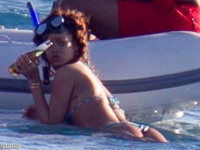 16P Rihanna exposing sexy body and hot ass in bikini while snorkling