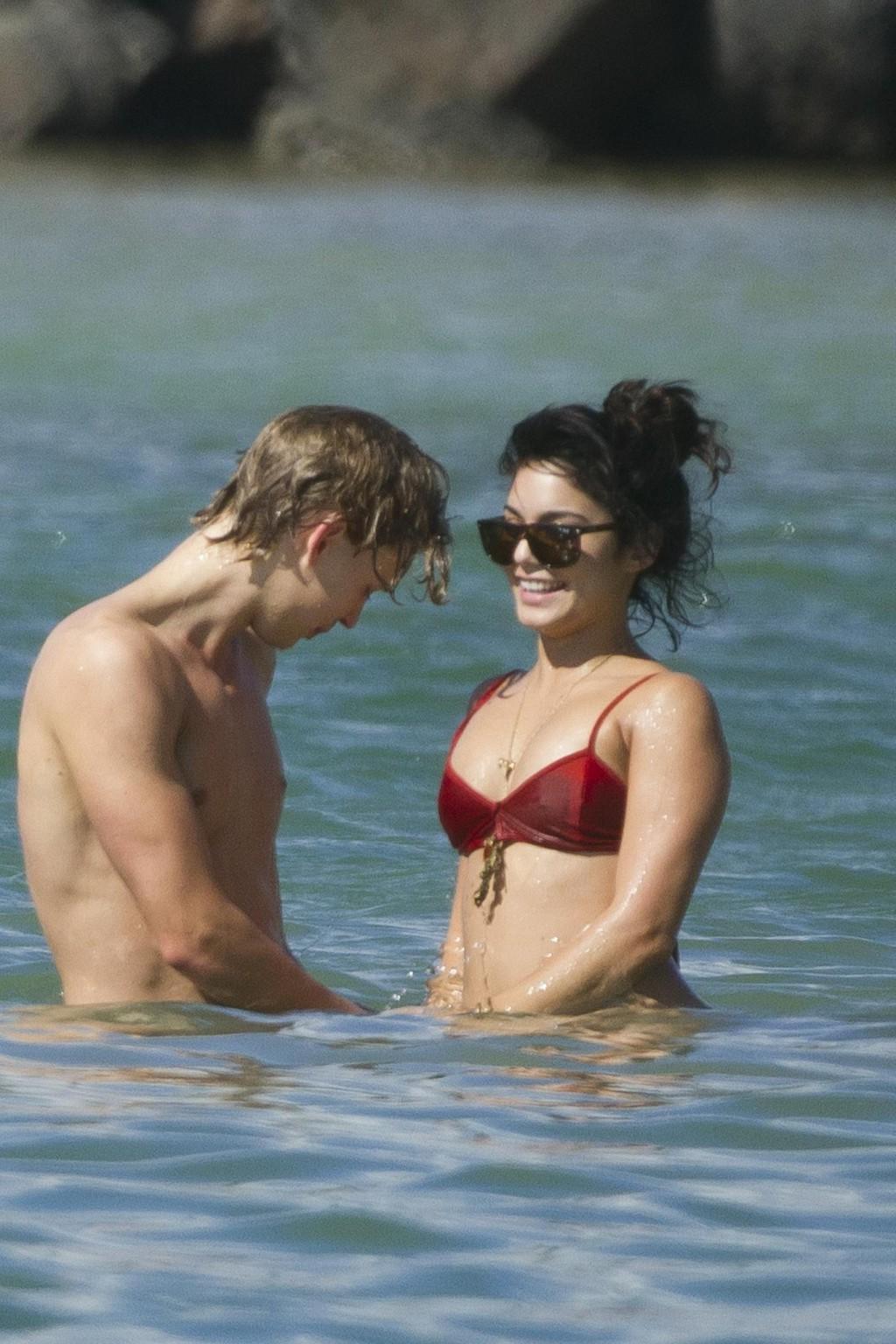16P Vanessa Hudgens in sexy red bikini making out with her boyfriend on a Hawaiian b