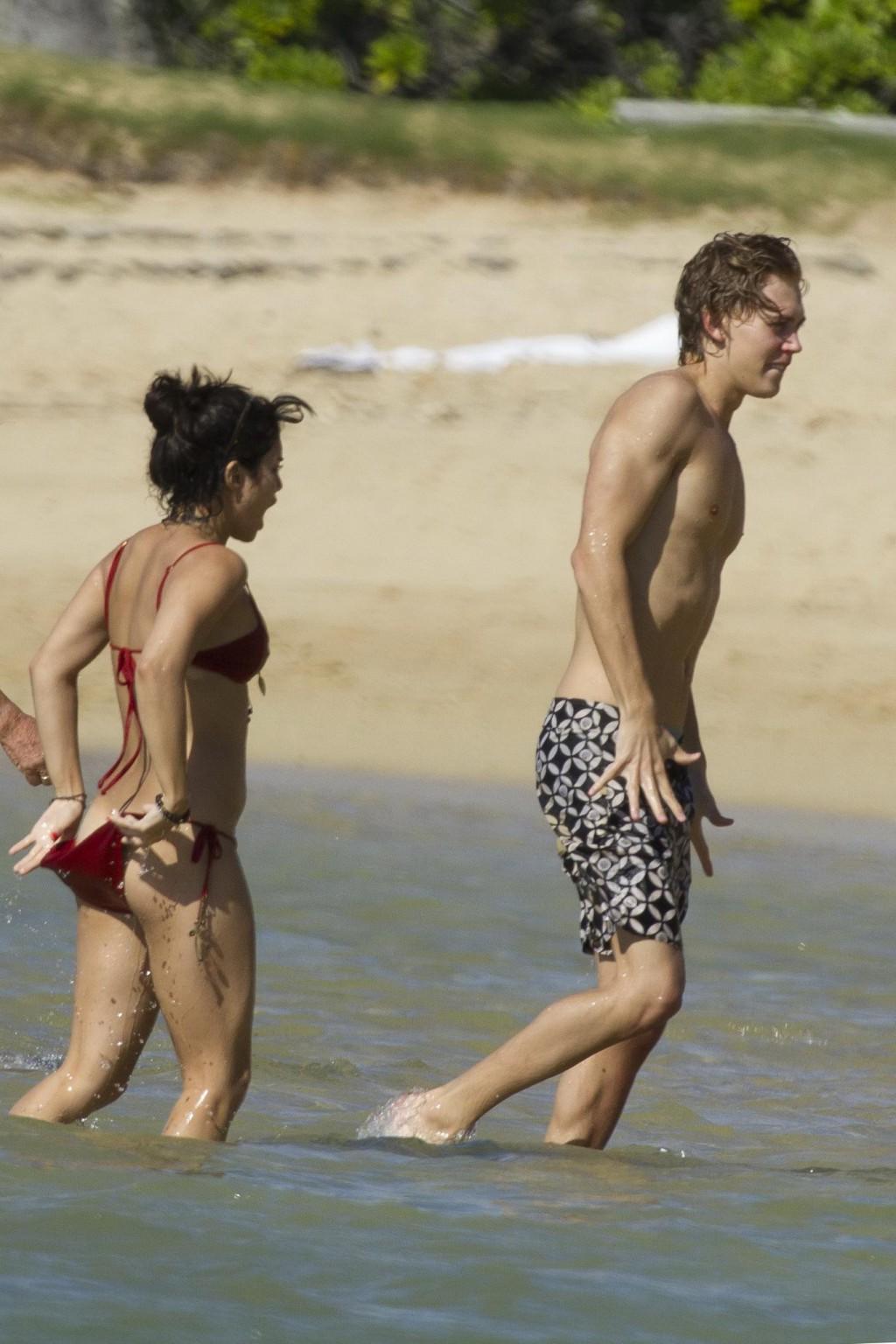 16P Vanessa Hudgens in sexy red bikini making out with her boyfriend on a Hawaiian b