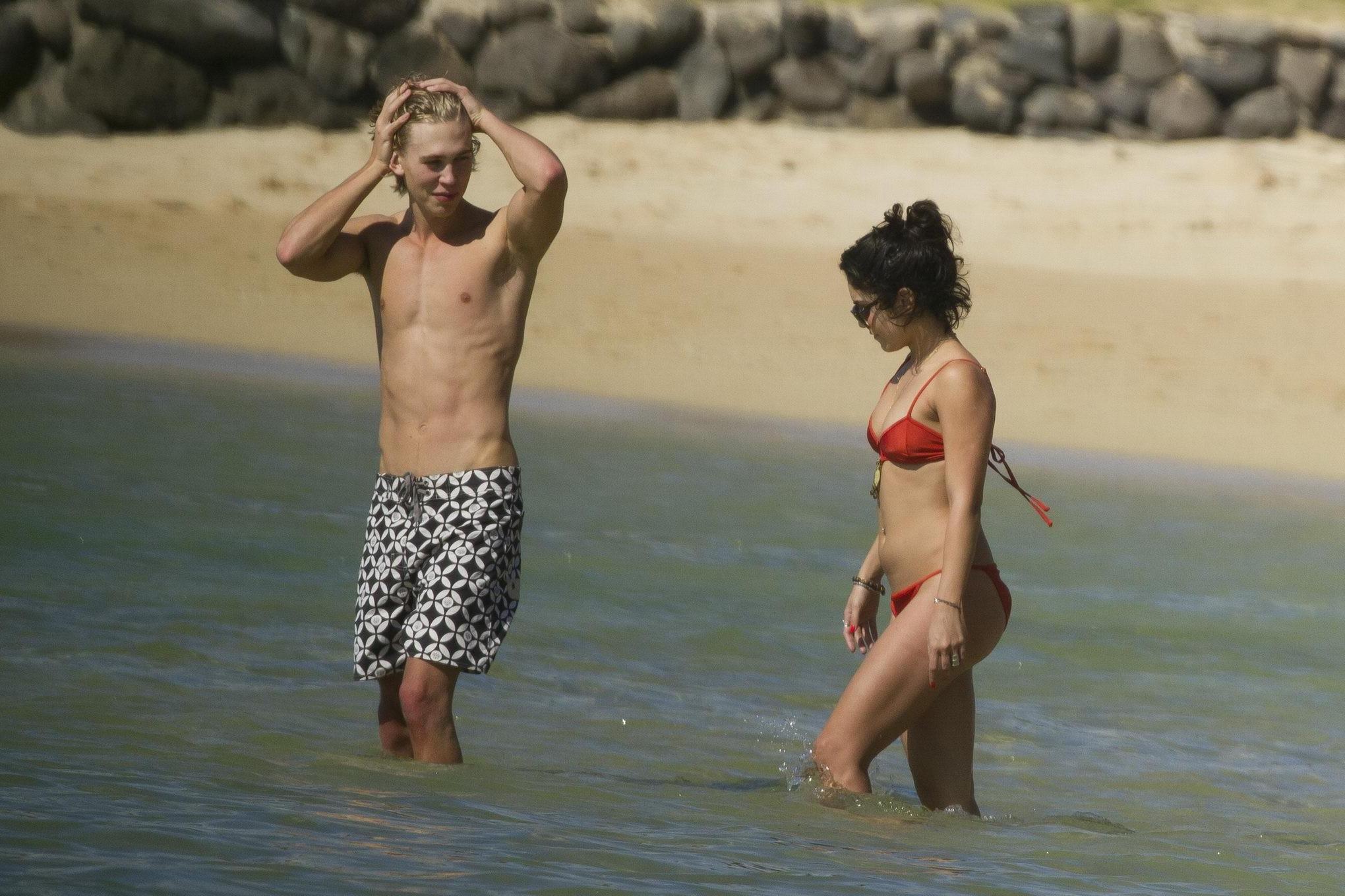 16P Vanessa Hudgens in sexy red bikini making out with her boyfriend on a Hawaiian b