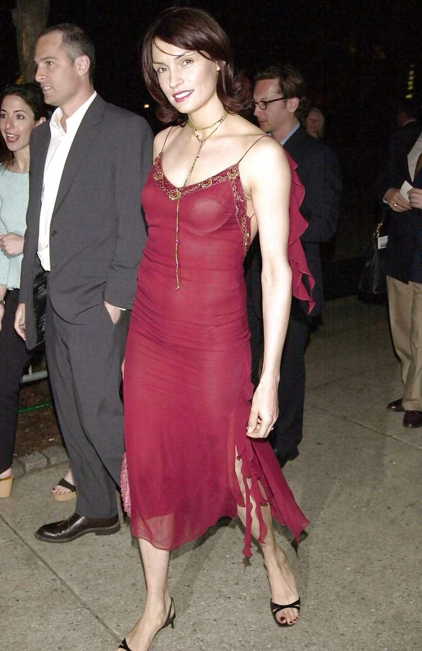 16P Famke Janssen showing thong in see thru dress and posing in lingerie