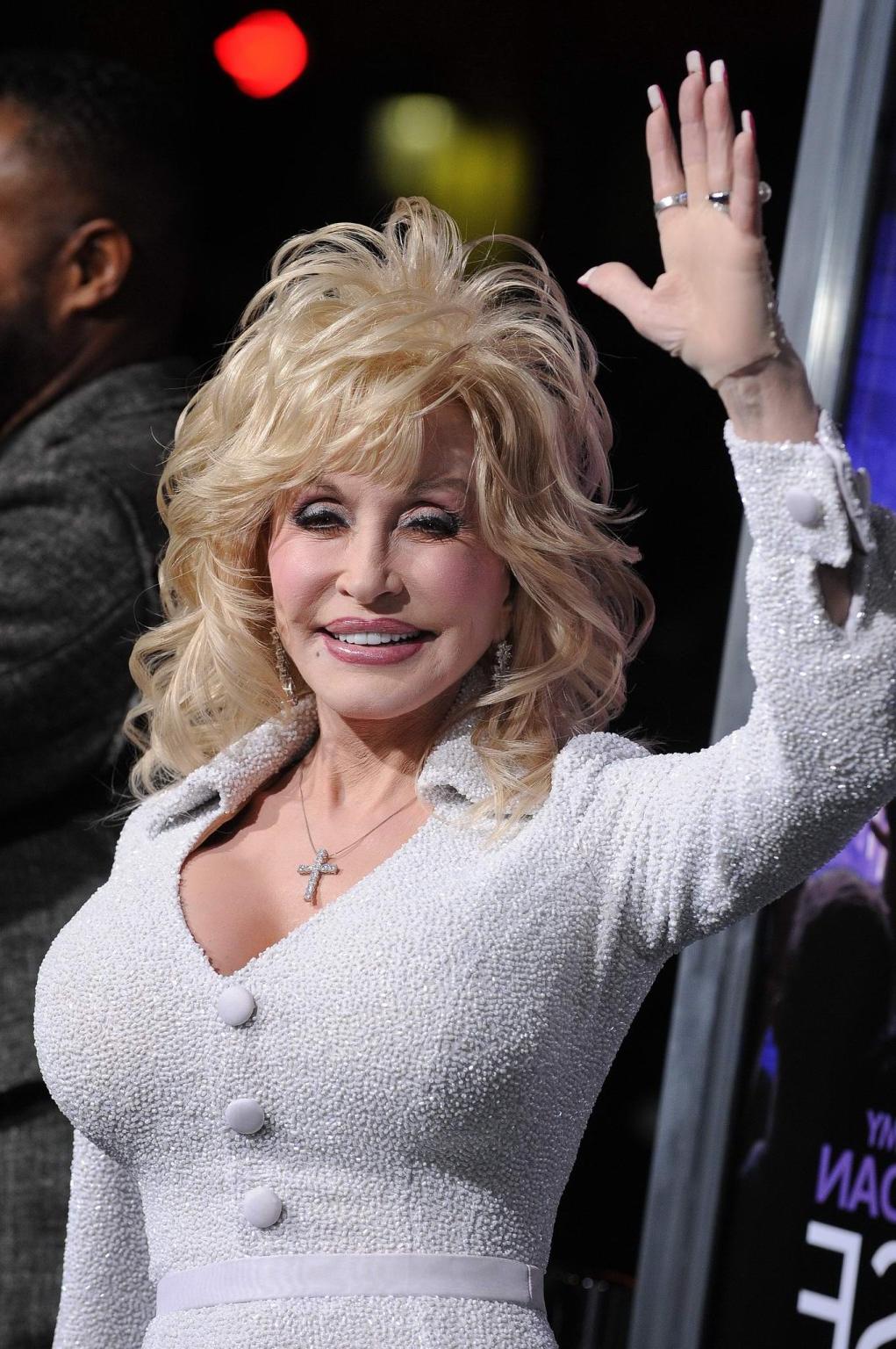 16P Dolly Parton busty wearing tight white dress at the 'Joyful Noise' premiere in L