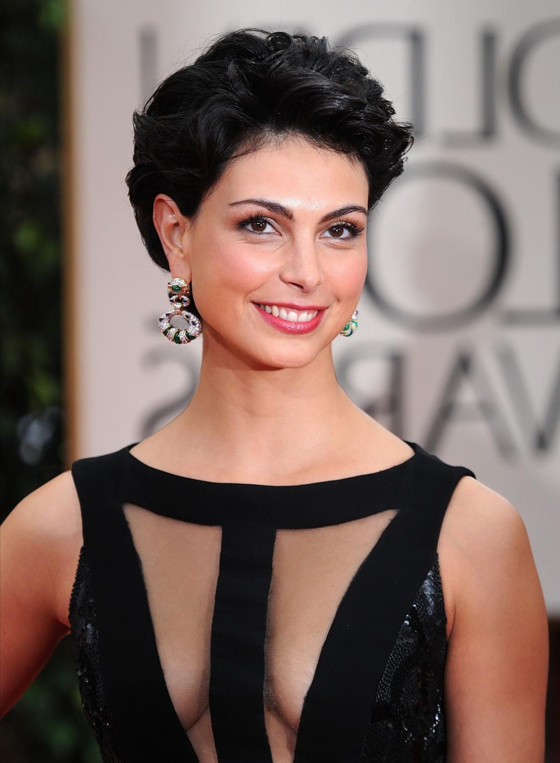 16P Morena Baccarin braless wearing sexy black dress at the Golden Globes 2012
