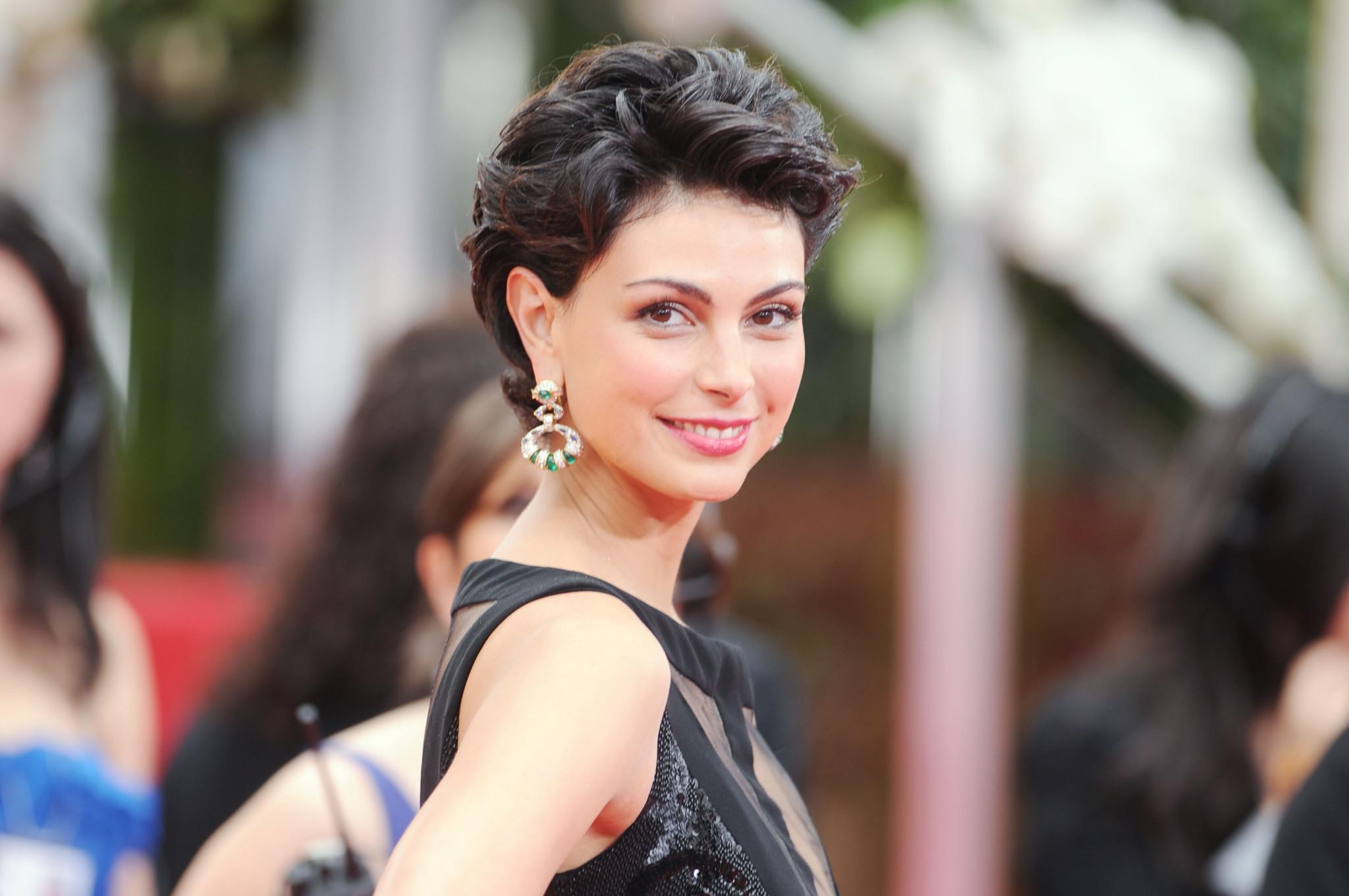 16P Morena Baccarin braless wearing sexy black dress at the Golden Globes 2012