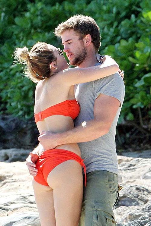 16P Miley Cyrus exposing huge cleavage and sexy ass in thong