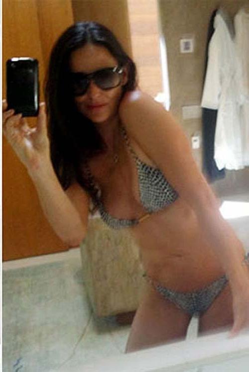 16P Demi Moore posing totally nude and showing her hairy pussy