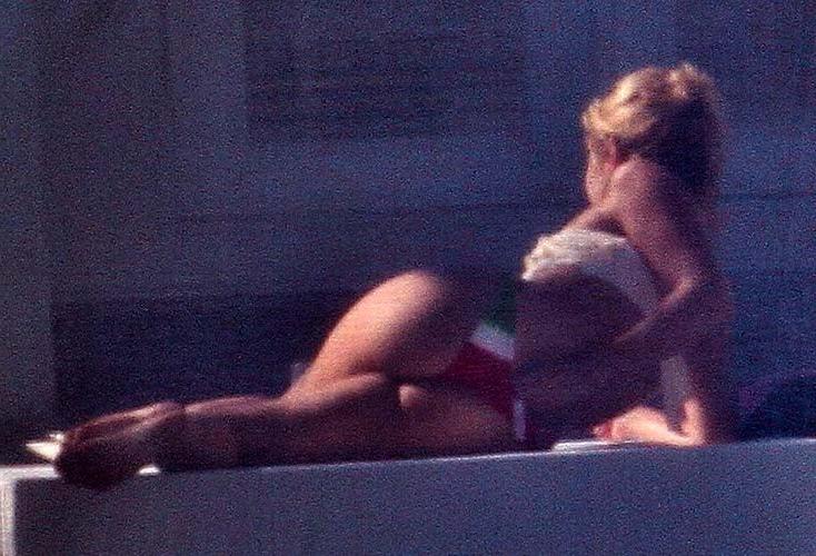 16P Shakira exposing sexy body and hot ass in thong by the pool