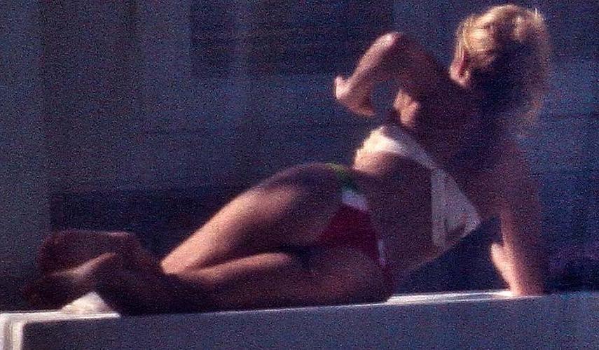 16P Shakira exposing sexy body and hot ass in thong by the pool