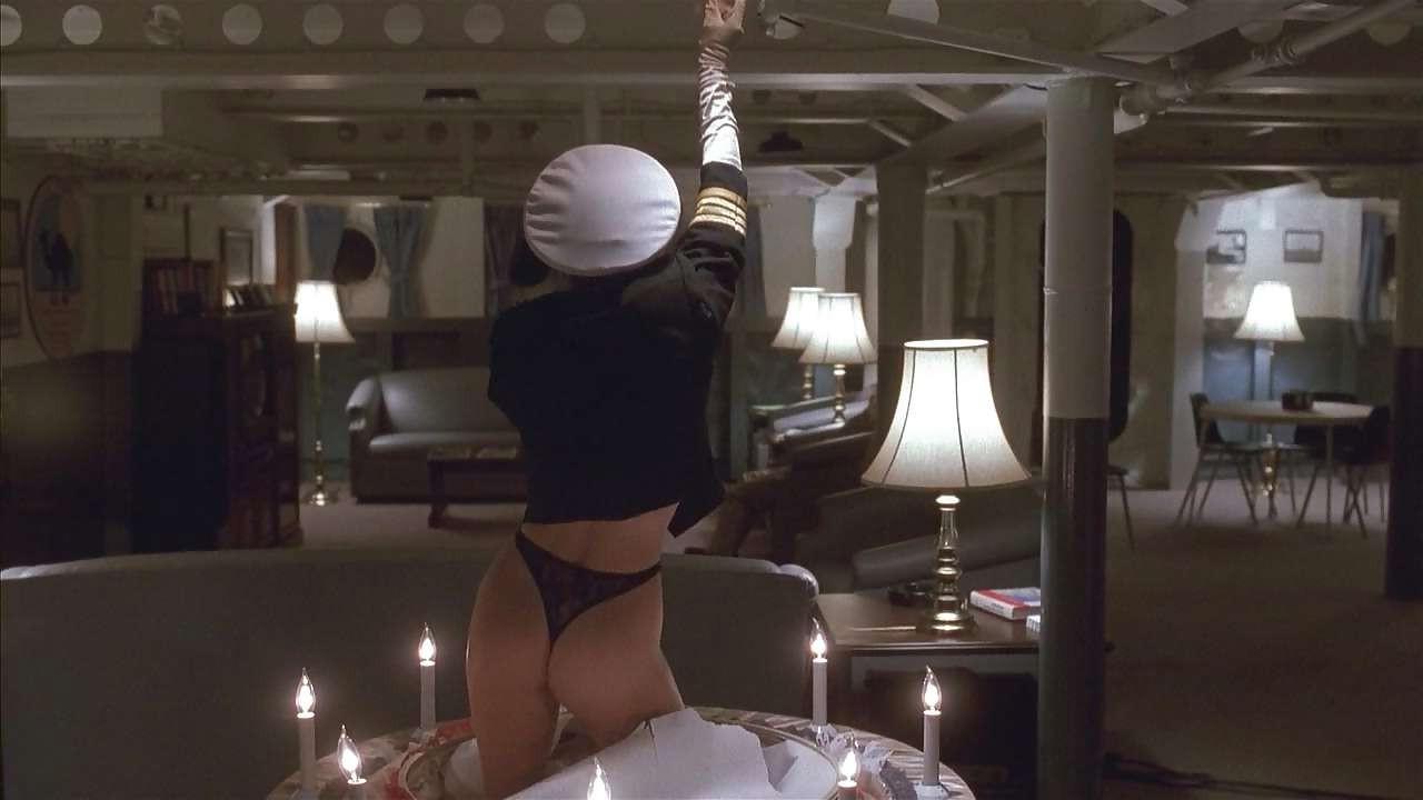 16P Erika Eleniak showing her nice big tits and ass in thong