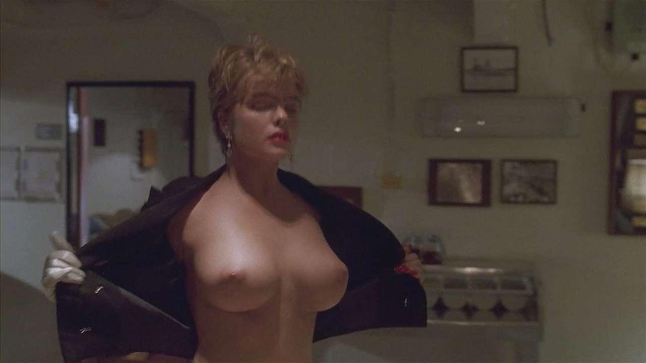 16P Erika Eleniak showing her nice big tits and ass in thong