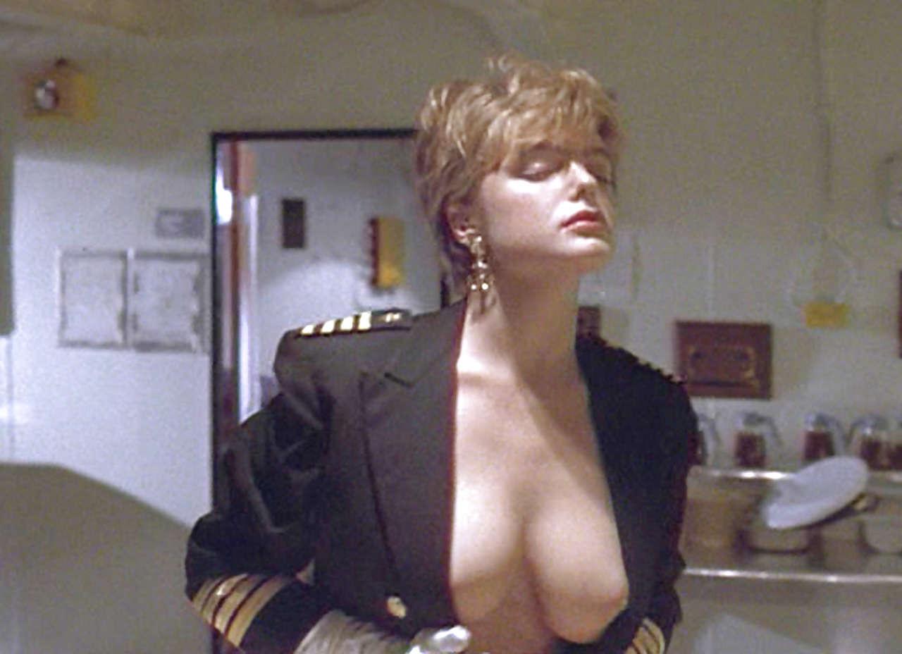 16P Erika Eleniak showing her nice big tits and ass in thong