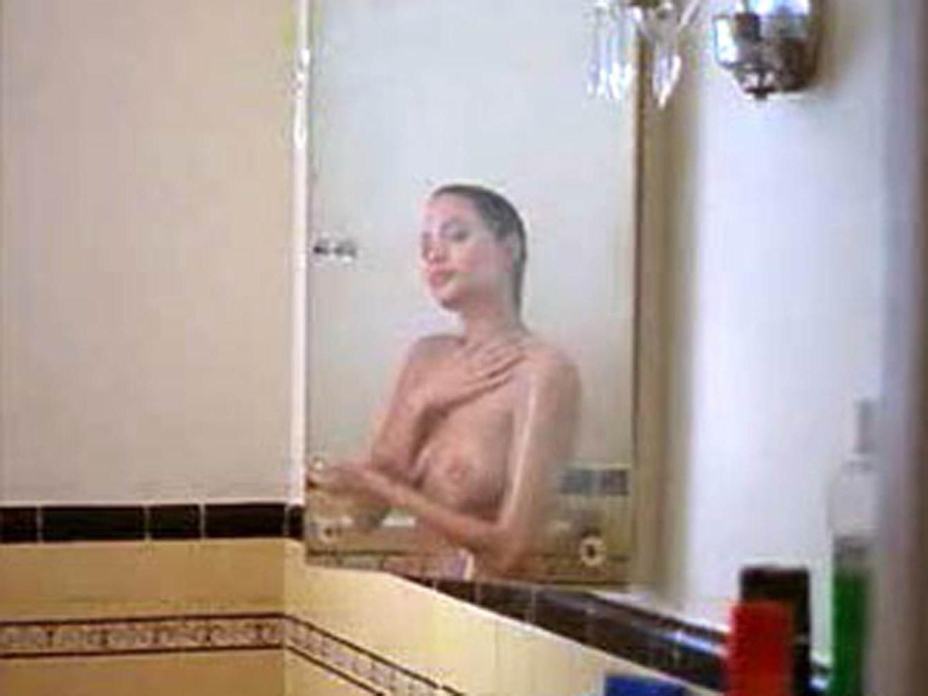 16P Angelina Jolie showing her incredible soft boobs