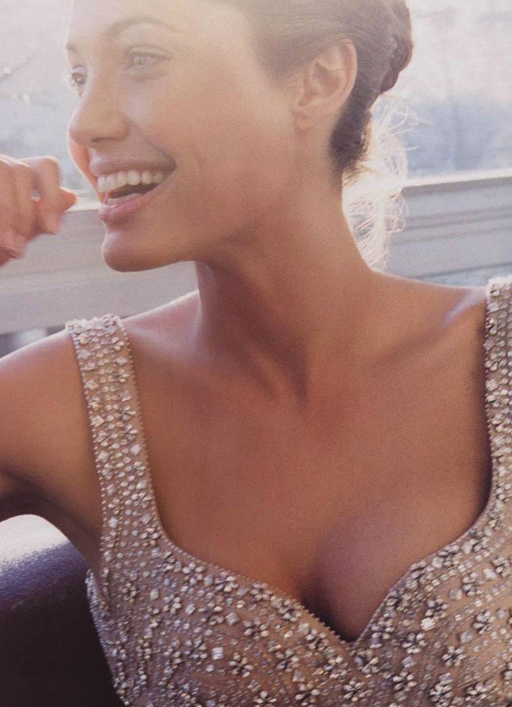 16P Angelina Jolie showing her incredible soft boobs