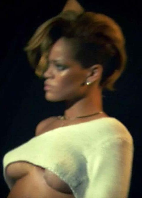 16P Rihanna posing and showing her huge boobs and sexy body