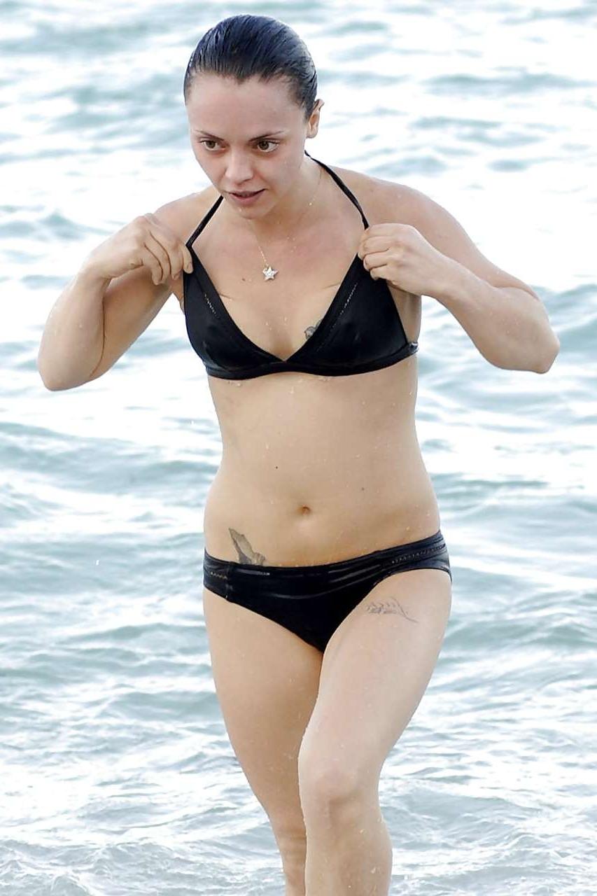 16P Christina Ricci showing her ass and small tits and dancing in mini skirt