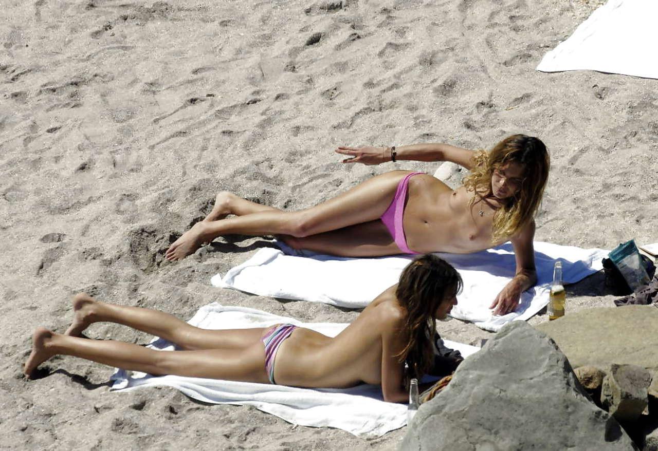 16P Daria Werbowy showing her big boobs sunbathing topless with friend