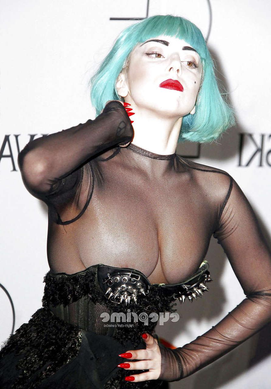 16P Lady Gaga on stage in thong showing her ass and see thru dress