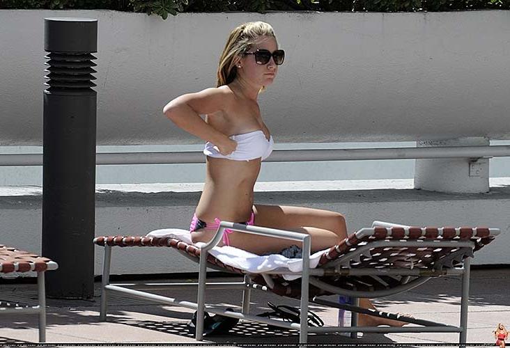 16P Ashley Tisdale exposing her sexy body and hot ass in bikini on pool
