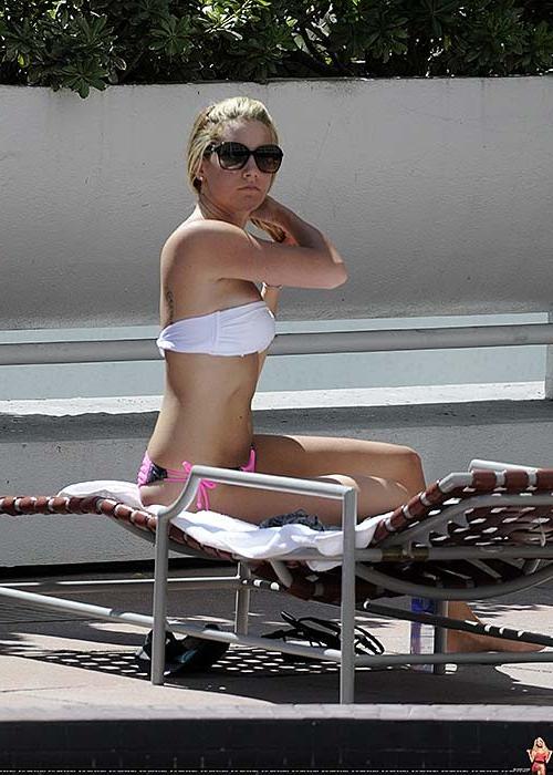 16P Ashley Tisdale exposing her sexy body and hot ass in bikini on pool